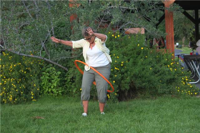 Barb Kish trying the hula hoop.jpg